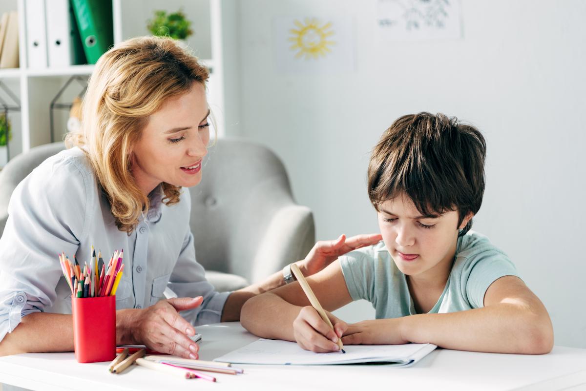 Educational psychologist with a pupil