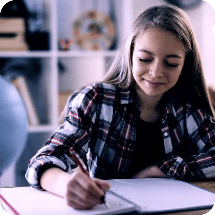 Girl taking an exam on paper