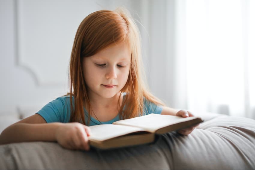 a child reading on her own